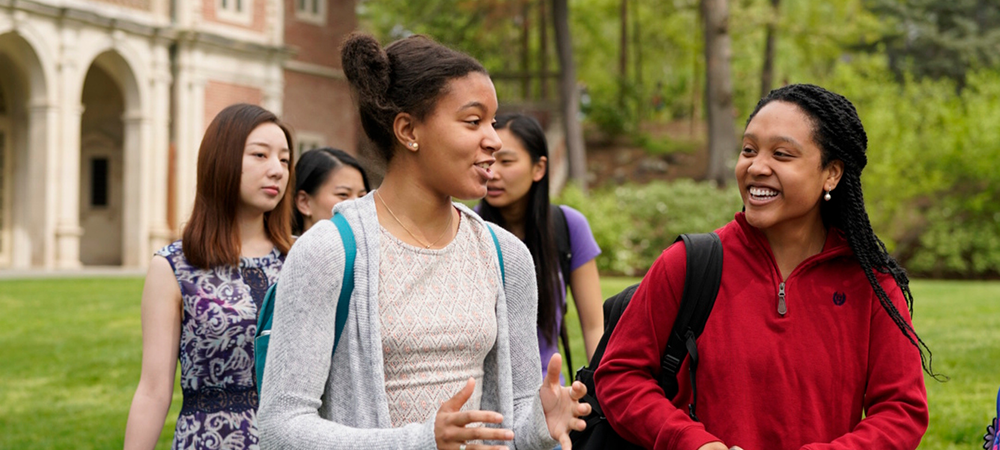 students walking out side on campus